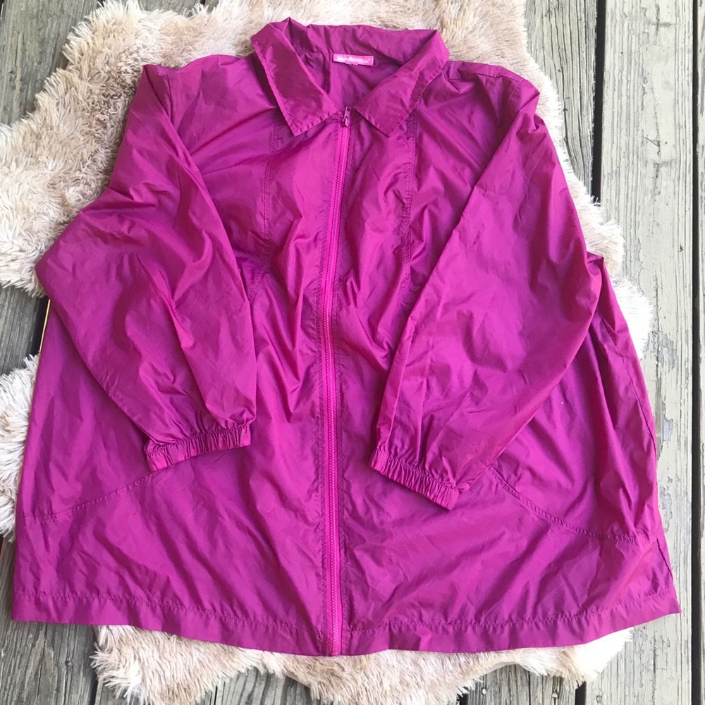 Woman within Pink wind breaker jacket